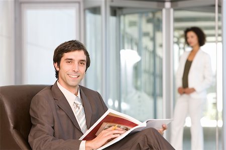 businessman reading document Stock Photo - Budget Royalty-Free & Subscription, Code: 400-04603623