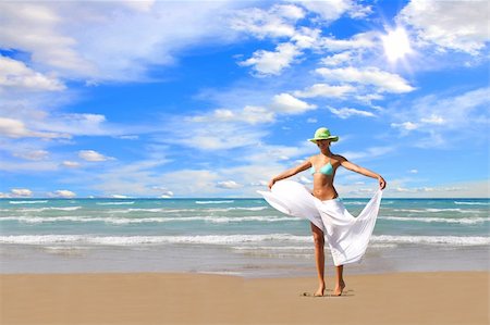 Beautiful young woman enjoying the Ionian sea in Greece Photographie de stock - Aubaine LD & Abonnement, Code: 400-04614154