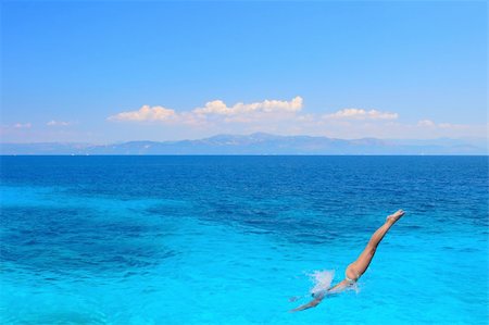 simsearch:400-08730448,k - Beautiful young woman enjoying the Ionian sea in Greece Stock Photo - Budget Royalty-Free & Subscription, Code: 400-04614163