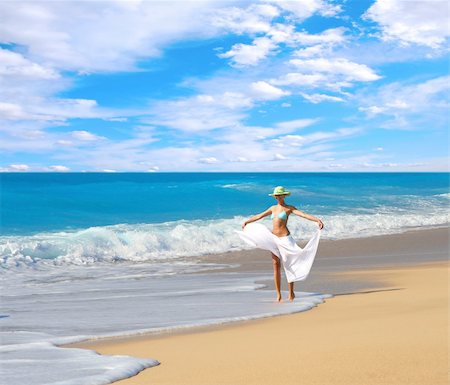 Beautiful young woman enjoying the Ionian sea in Greece Photographie de stock - Aubaine LD & Abonnement, Code: 400-04614176