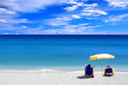 Couple on the beach enjoying the Ionian sea in Greece Stock Photo - Budget Royalty-Free & Subscription, Code: 400-04614177