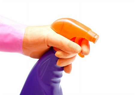 rubber hand gloves - Cleaning spray bottle in a hand isolated on white Stock Photo - Budget Royalty-Free & Subscription, Code: 400-04614470