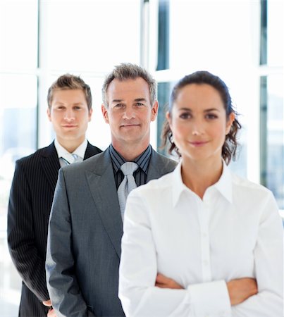 Senior businessman in a row with his business team Stock Photo - Budget Royalty-Free & Subscription, Code: 400-04614500