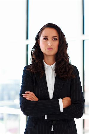 simsearch:400-07246047,k - Portrait of a confident businesswoman with folded arms in office Foto de stock - Super Valor sin royalties y Suscripción, Código: 400-04614538