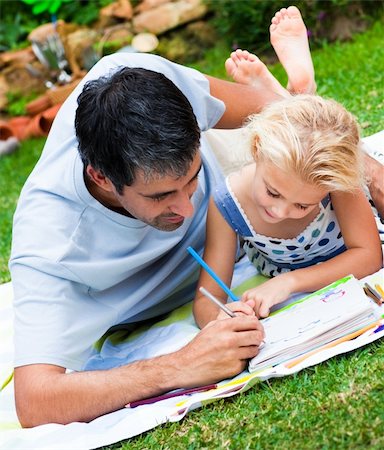 Dad and daughter painting together in a garden Stock Photo - Budget Royalty-Free & Subscription, Code: 400-04614619