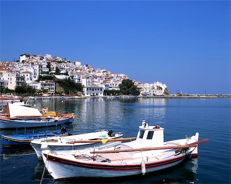 skopelos island - Fishing boats in the port os Skopelos a Greek island Fotografie stock - Microstock e Abbonamento, Codice: 400-04614670