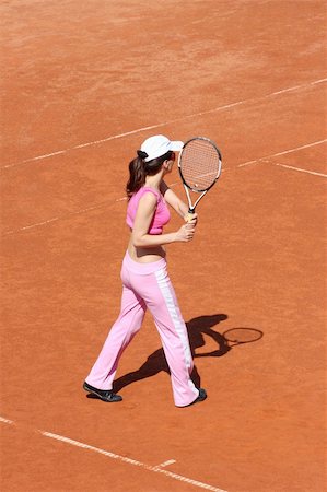 simsearch:400-06061549,k - Girl playing tennis outdoor on court Photographie de stock - Aubaine LD & Abonnement, Code: 400-04614747