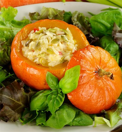 Baked golden nugget pumpkin with rice stuffing ready to serve. Foto de stock - Super Valor sin royalties y Suscripción, Código: 400-04614837