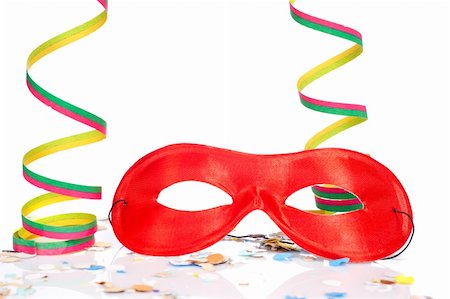 simsearch:400-04546218,k - Red mask, ribbons and confetti on white background. Shallow depth of field Stock Photo - Budget Royalty-Free & Subscription, Code: 400-04615057