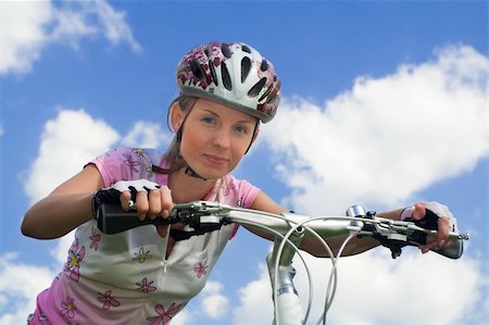 simsearch:400-04336549,k - Cyclist girl looking at camera, close shot Fotografie stock - Microstock e Abbonamento, Codice: 400-04615550