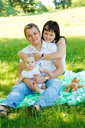 simsearch:400-07715953,k - Happy family having fun  in the park Stock Photo - Budget Royalty-Free & Subscription, Code: 400-04615772