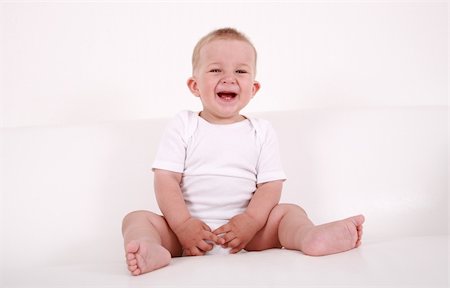 simsearch:400-04161658,k - Portrait of cute newborn laughing Fotografie stock - Microstock e Abbonamento, Codice: 400-04615961