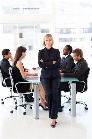 simsearch:400-04918393,k - Serious female manager looking at the camera with folded arms Stock Photo - Budget Royalty-Free & Subscription, Code: 400-04616481