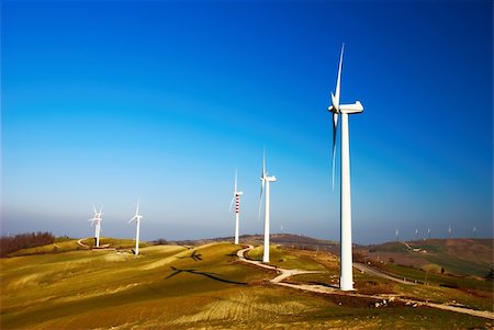 Modern and ecologic generators on top of a hill Foto de stock - Super Valor sin royalties y Suscripción, Código: 400-04616741