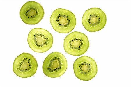 simsearch:400-04553701,k - Kiwi green transparent slices over white background Stock Photo - Budget Royalty-Free & Subscription, Code: 400-04617485