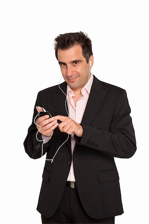 Businessman in suit that hears music from mp3 player Stock Photo - Budget Royalty-Free & Subscription, Code: 400-04617499