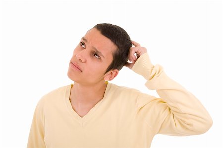 simsearch:400-04234249,k - Young man with a pensive expression looking up Stockbilder - Microstock & Abonnement, Bildnummer: 400-04617994