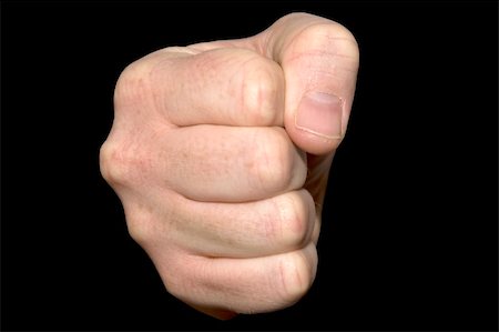 simsearch:400-05218807,k - Close up of a clenched fist on a black background Foto de stock - Royalty-Free Super Valor e Assinatura, Número: 400-04618092