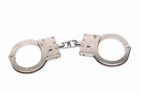 simsearch:400-05300234,k - Isolated handcuffs on white Fotografie stock - Microstock e Abbonamento, Codice: 400-04618102