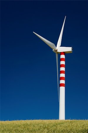 Single wind turbine in golden wheat field Foto de stock - Super Valor sin royalties y Suscripción, Código: 400-04618351