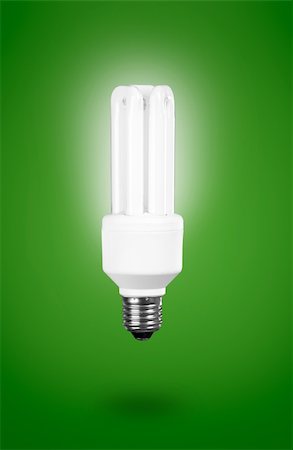 simsearch:400-04626612,k - Fluorescent Light Bulb on a green background Ð energy concept Foto de stock - Super Valor sin royalties y Suscripción, Código: 400-04618795