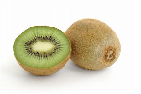 simsearch:400-05896925,k - One and a half kiwi fruit on white background. Photographie de stock - Aubaine LD & Abonnement, Code: 400-04610080