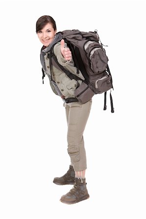 simsearch:400-04110220,k - happy brunette woman ready to travel. over white background Stock Photo - Budget Royalty-Free & Subscription, Code: 400-04610320