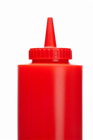 Ketchup bottle isolated on a white background Stock Photo - Budget Royalty-Free & Subscription, Code: 400-04610337