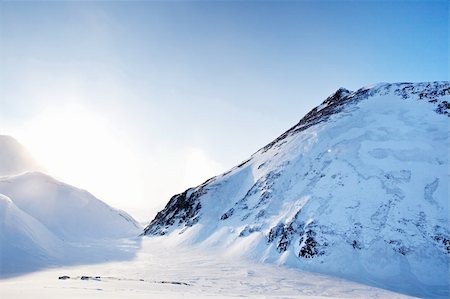 simsearch:400-05140080,k - A winter mountain landscape - Svalbard Norway Fotografie stock - Microstock e Abbonamento, Codice: 400-04610561