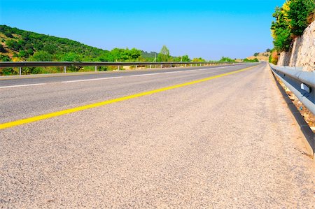 Empty Highway In North Galilee, Israel, Against Blue Sky. Photographie de stock - Aubaine LD & Abonnement, Code: 400-04611072