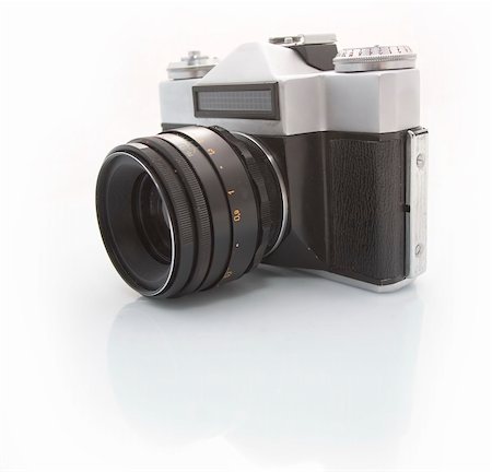 simsearch:400-04527928,k - retro photo camera isolated on white Foto de stock - Super Valor sin royalties y Suscripción, Código: 400-04611235