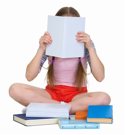 school girl holding pile of books - Girl reading the book on the white background Stock Photo - Budget Royalty-Free & Subscription, Code: 400-04611850