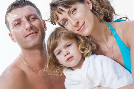 simsearch:400-04062793,k - Portrait of young family having fun on the beach Photographie de stock - Aubaine LD & Abonnement, Code: 400-04612023