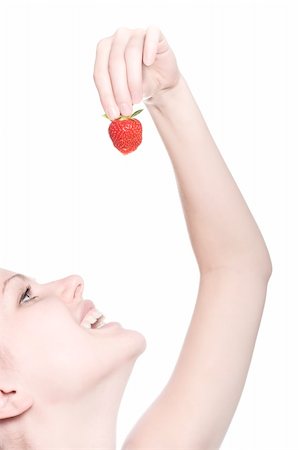 simsearch:400-04513818,k - beautiful blonde girl is going to eat a strawberry Stock Photo - Budget Royalty-Free & Subscription, Code: 400-04612588