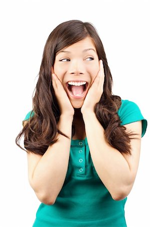 portrait screaming girl - Excited young woman looking away in surprise. Isolated on white. Stock Photo - Budget Royalty-Free & Subscription, Code: 400-04612756