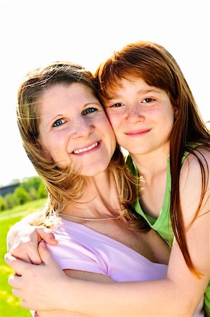 simsearch:400-04612785,k - Portrait of happy child hugging her mother Stock Photo - Budget Royalty-Free & Subscription, Code: 400-04612786