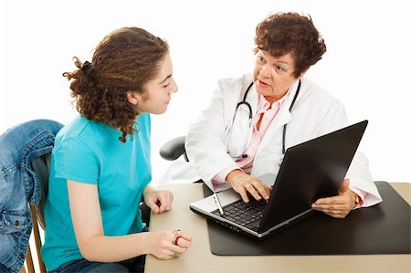 Female doctor has a serious discussion with her teen patient as they go over medical records on the computer. Stockbilder - Microstock & Abonnement, Bildnummer: 400-04612968