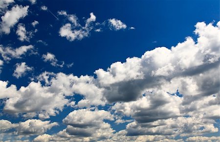 simsearch:400-03944472,k - White clouds over blue sky - a great background image for many uses Stock Photo - Budget Royalty-Free & Subscription, Code: 400-04613436