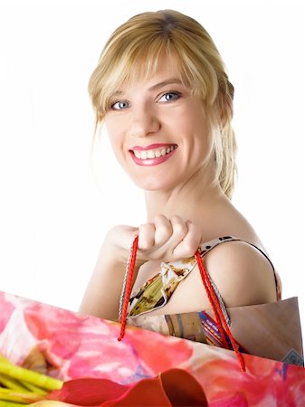 sergeitelegin (artist) - happy cute young woman shopping on the white background Stock Photo - Budget Royalty-Free & Subscription, Code: 400-04613444