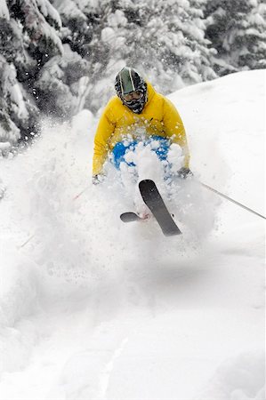 simsearch:400-04117720,k - Freeride Skier moving down and  jumping in powder snow. Photographie de stock - Aubaine LD & Abonnement, Code: 400-04613505