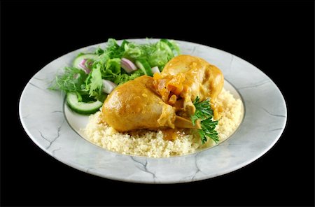 simsearch:400-04613511,k - Apricot chicken drumsticks with a green side salad. Fotografie stock - Microstock e Abbonamento, Codice: 400-04613509