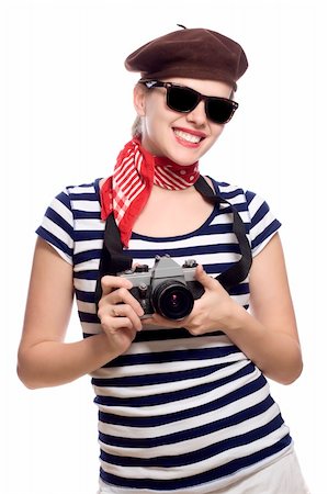 stylish woman snapshot - beautiful girl with red bandana, beret and striped shirt in a classic 60s french look holding a classic single lens reflex camera Stock Photo - Budget Royalty-Free & Subscription, Code: 400-04613849