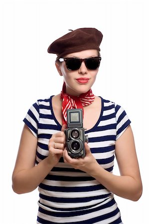 reflexe - beautiful girl with red bandana, beret and striped shirt in a classic 60s french look holding a vintage twin lens medium format camera Stockbilder - Microstock & Abonnement, Bildnummer: 400-04613842