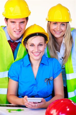 smiling industrial workers group photo - Portrait of young several employees Stock Photo - Budget Royalty-Free & Subscription, Code: 400-04624275