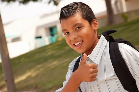 Happy Young Hispanic Boy with Backpack Ready for School. Stock Photo - Budget Royalty-Free & Subscription, Code: 400-04624600