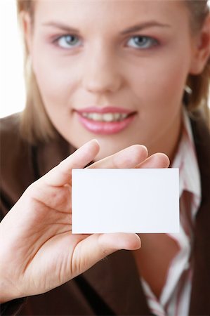 Lady with blank business card isolated on white background Stock Photo - Budget Royalty-Free & Subscription, Code: 400-04624798