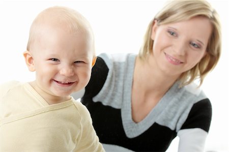 simsearch:400-04737497,k - Bright closeup portrait of adorable baby boy and his mom Stockbilder - Microstock & Abonnement, Bildnummer: 400-04624883