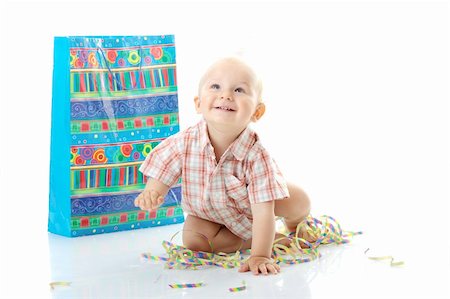 simsearch:400-06063102,k - Child boy in birthday hat over white Fotografie stock - Microstock e Abbonamento, Codice: 400-04624893