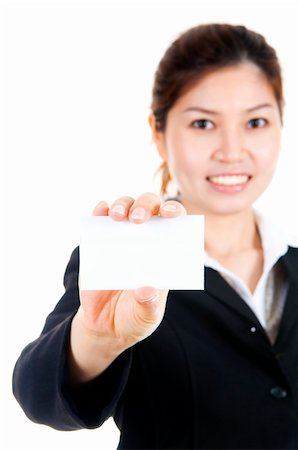 simsearch:400-06142860,k - Young Asian with blank business card in a hand. Fotografie stock - Microstock e Abbonamento, Codice: 400-04624902