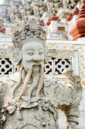 simsearch:400-03985821,k - Chinese warrior guardian statue at the Buddhist temple of Wat Arun in Bangkok, Thailand. Photographie de stock - Aubaine LD & Abonnement, Code: 400-04625082